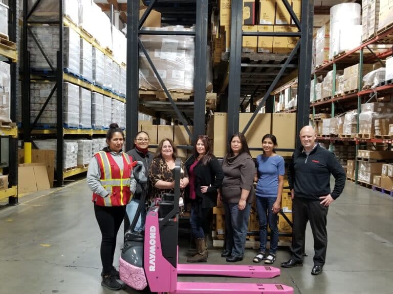 Prism Livermore Team With Pink Pallet Jack